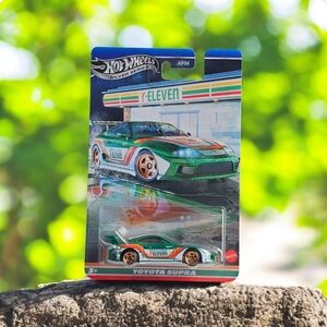 Hot Wheels 7-Eleven Toyota Supra Toy Car - Green and White